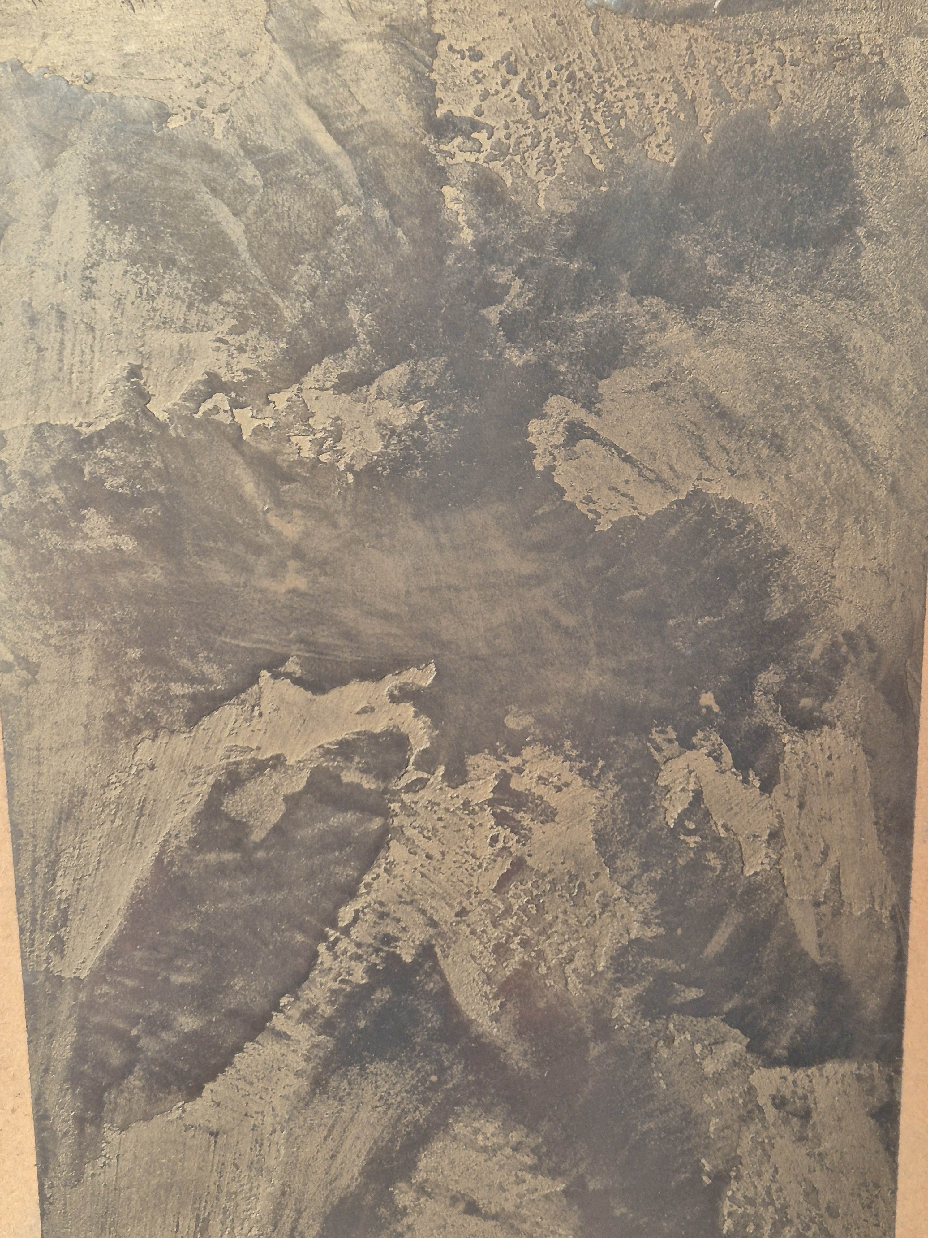 Charcoal textured decorative plaster in a boutique hotel reception area in Aberdeen