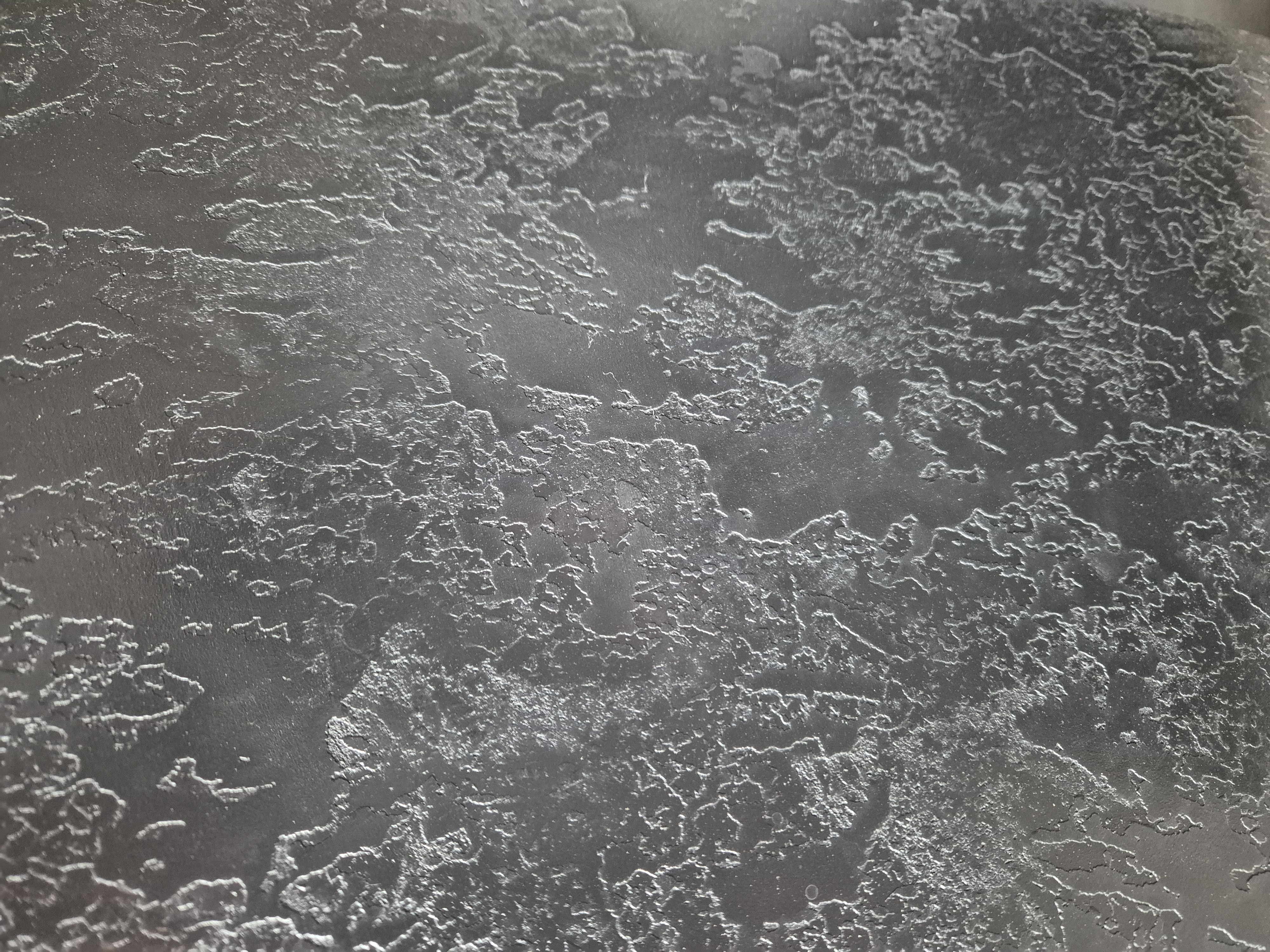 Dark textured plaster with gold accents transforming a dining room in Aberdeen