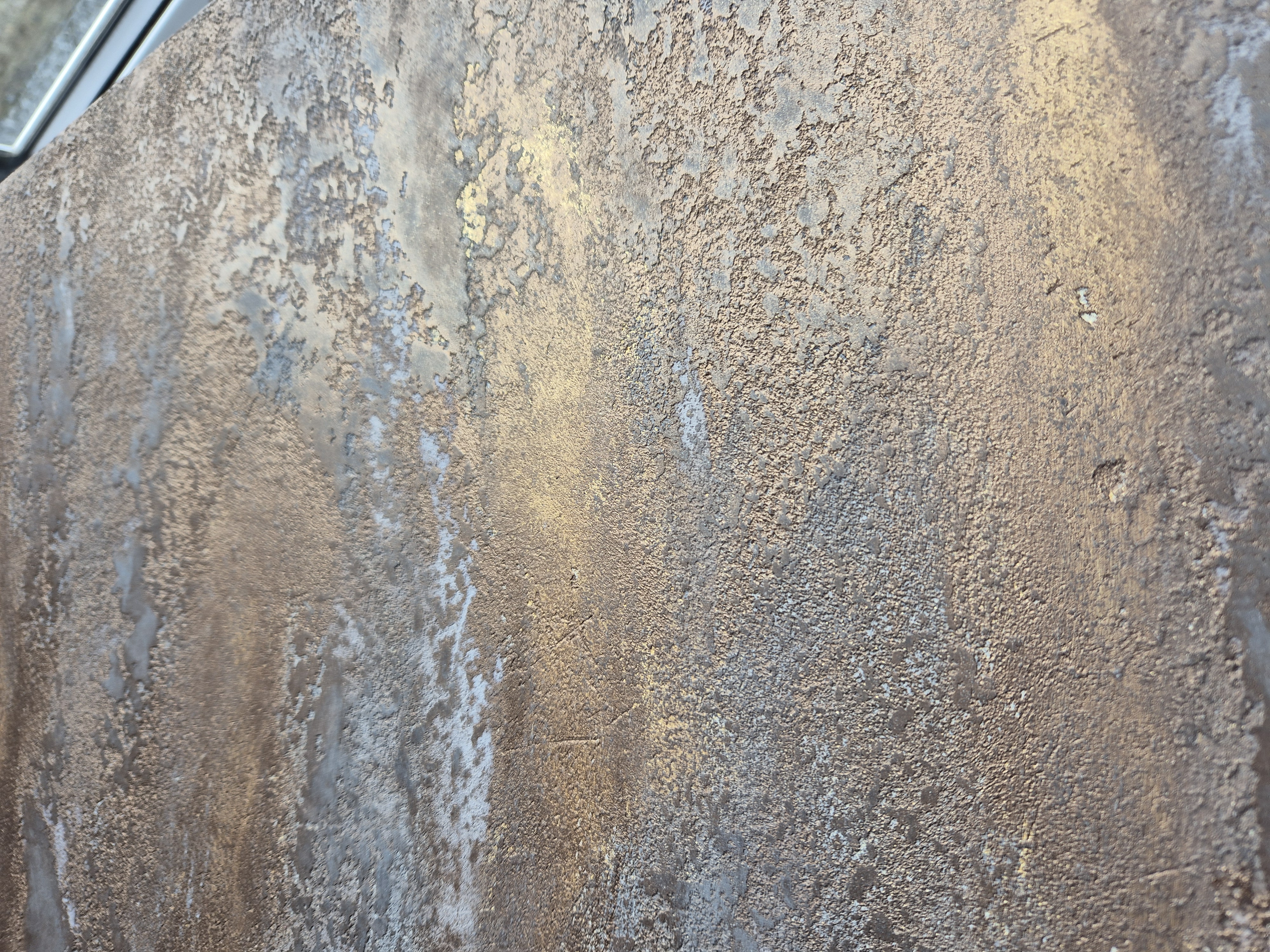 Decorative bronze metallic plaster texture background