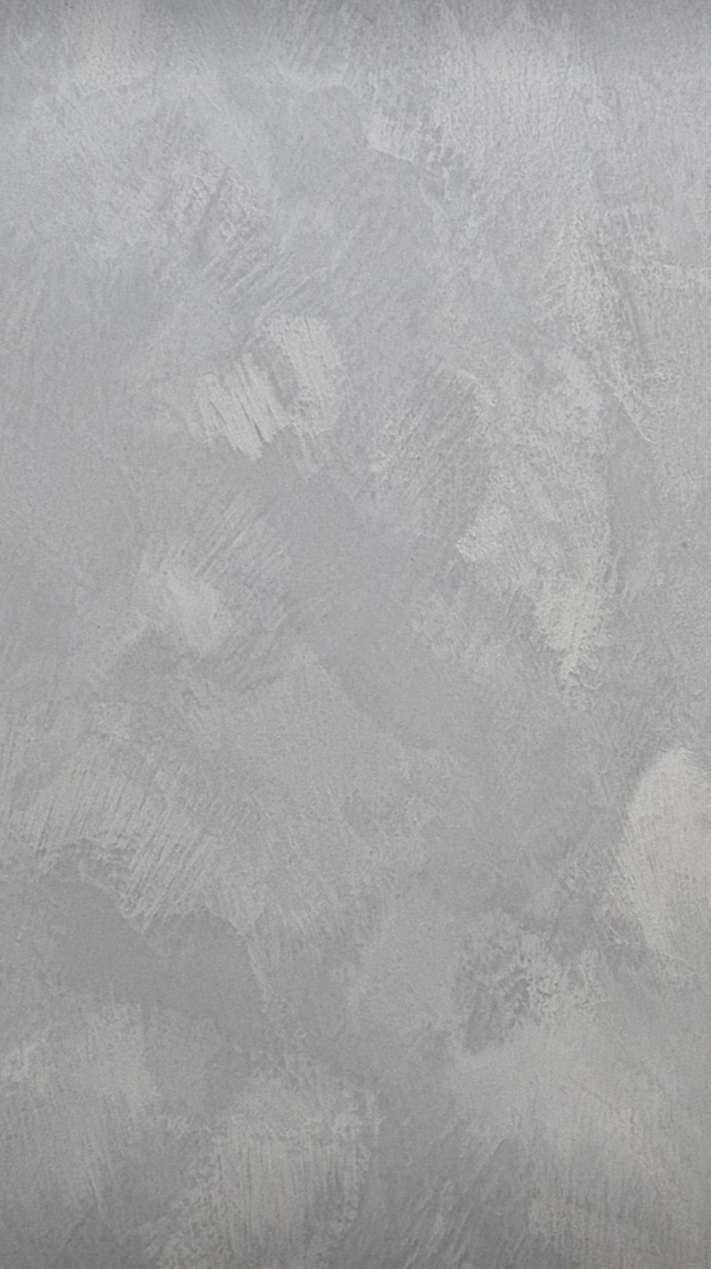 Smooth light grey polished plaster finish